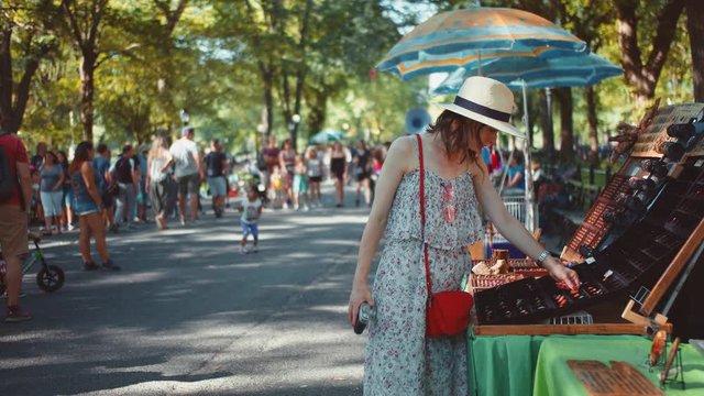 Young customer at a store in a park