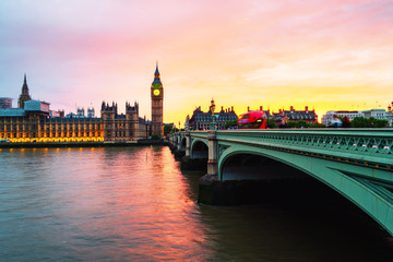 Sunset over the city of London, UK. Colorful sky behind Westminster and Big Ben