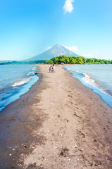 Way beach to the island with the gran volcano