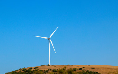 Wind energy, green renewable energy. Wind generator turbines landscape