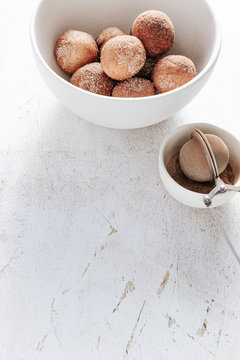 bowl of cinnamon sugar doughnuts