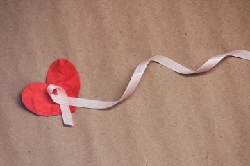 Pink ribbon. Symbol of breast cancer awareness. Health care conception. Preventive measures. October checking time. Women health.