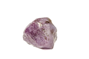 macro mineral stone alexandrite red - violet in daylight on a white