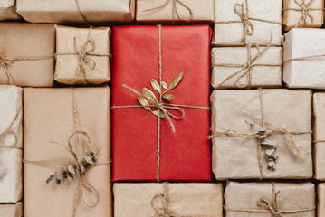 Various gift boxes wrapped in eco-friendly craft paper with strings
