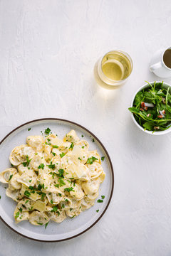 plate of tortellini vertical shot