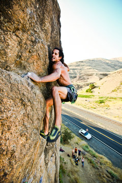 Adrian Daigle climbs Hand Over Hand 5.11a at Granite Point, a small climbing area along the Snake River in southeast Washington.