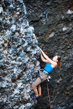 Loni Budwig on the start of the Roach (5.11a) at Deep Creek.
