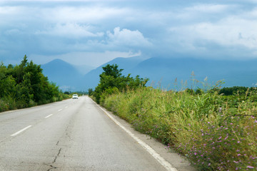 Scenic road into the storm clouds in Olympus mountains, Greece