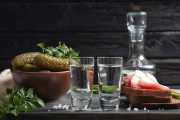Cold Russian vodka with snacks on table
