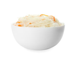 Bowl of tasty fermented cabbage isolated on white