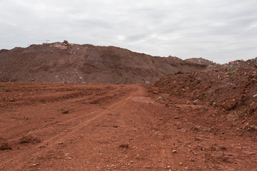 Low angle horizon landscape of mound and dirt road