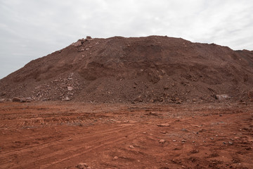 Earthwork gravel space background view stacked into hills
