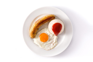 Arroz a la cubana.Typical Cuban rice with fried banana and fried egg on a plate isolated on white background. Top view