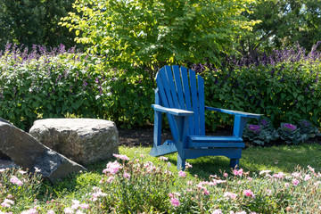 Empty blue chair in a park in Montreal.Canada