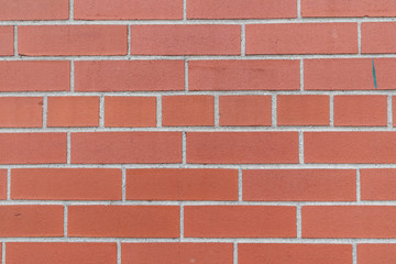 Red brick wall closeup texture