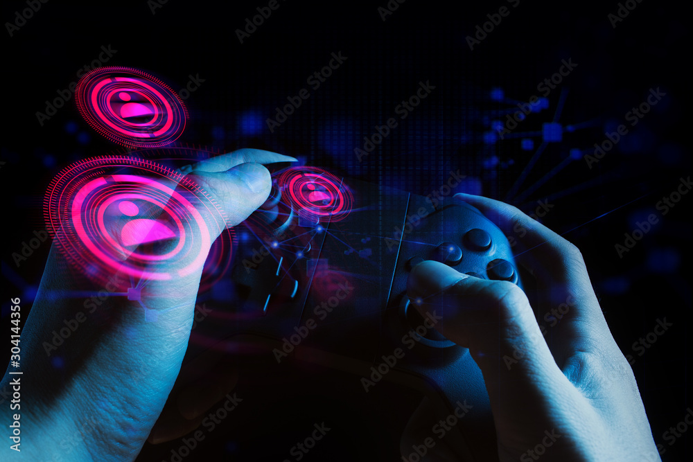 Poster gamer boy with hand holding the joystick controller electronic for playing game with online network 