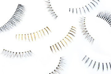 fake false eye lashes on white background 