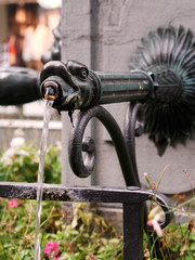 Close-up of public water fountain in Lausanne, Switzerland