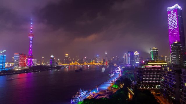 Shanghai huangpu river urban cityscape aerial skyline panorama timelapse at night zoom out