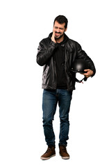 Naklejka premium Full-length shot of Biker man with toothache over isolated white background