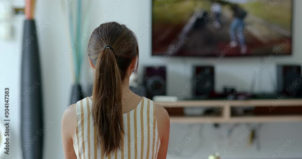 Poster Woman watch tv at home