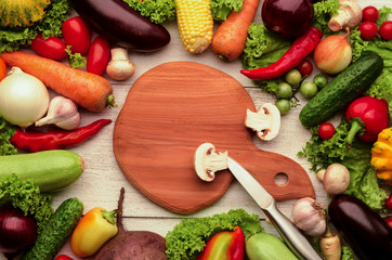 Cutting board, knife, mushroom vegetables for cooking.