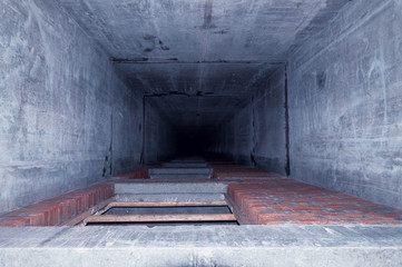 Inside the elevator shaft in a concrete building. © Vasiliy Ulyanov