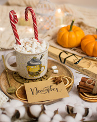 Christmas cookies with coffee cup and pumpkin.