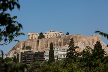 Fototapeta na wymiar The ancient Acropolis at Athens city center