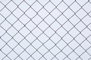 Fototapeta premium Abstract background in the form of a mesh netting on a white background close-up.иииииииииииии