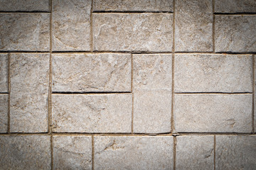 Obraz premium textura de una pared de ladrillos grandes con musgo