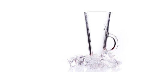 glass of fresh clear water with ice