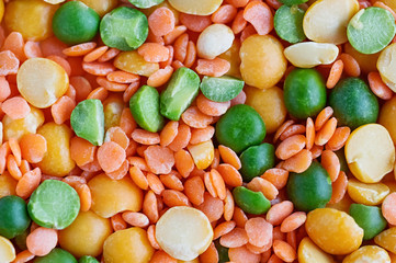 Dried peas and lentils close-up. Background from a mixture of legumes.