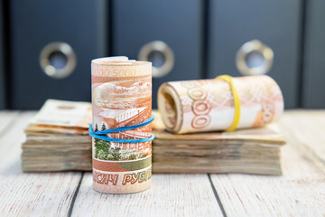 Time to pay taxes. A lot of Russian money. Denominations of five thousand rubles