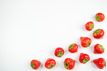 Strawberry on white background, top view. Berries pattern. Fresh strawberry isolated on white background. Creative food concept. Copy space, flat lay