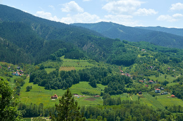Fototapeta na wymiar Hills and valleys in spring