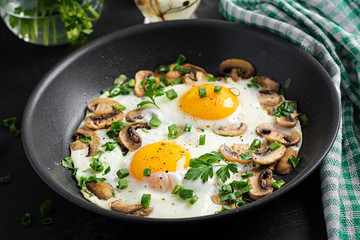 Fried egg, mushrooms and spinach. Keto, paleo breakfast.