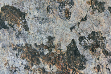 Concrete wall texture background. Natural stones. Building's facade decor. Decorative plaster. House exterior.