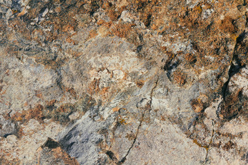 Concrete wall texture background. Natural stones. Building's facade decor. Decorative plaster. House exterior.