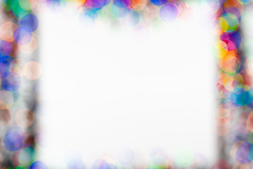 Frame made of Christmas blur colorful light on the background white color