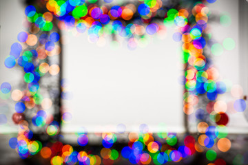 Frame made of Christmas blur colorful light on the background white color