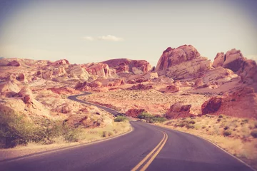 Selbstklebende Fototapeten Hochrot Beautiful desert road through Valley of Fire State Park in Nevada  © littleny