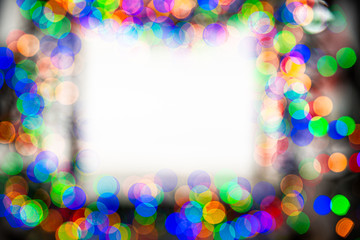 Frame made of Christmas blur colorful light on the background white color