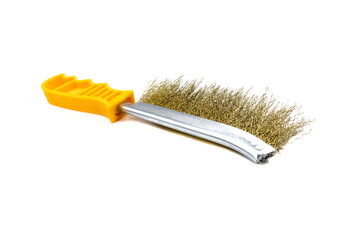 hand brush with metal bristles, with yellow handle on isolated white background