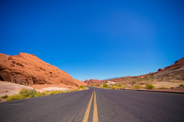 Fototapeta na wymiar Beautiful desert road through Valley of Fire State Park in Nevada