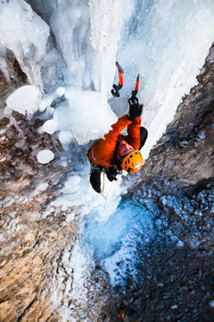 A man on The Cable in gently-overhanging, sustained WI5+ conditions. The roughly 200 ft route rarely forms all the way to the ground and is one of the hardest and most aesthetic lines at Banks Lake in central Washington State, a region with great but volatile ice climbing conditions.