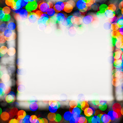 Frame made of Christmas blur colorful light on the background white color