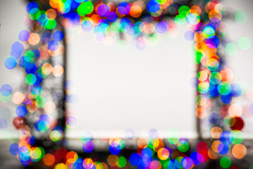 Frame made of Christmas blur colorful light on the background white color