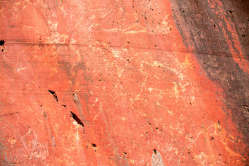 Red marble wall in an abandoned quarry in the eastern alps near Winzendorf in Austria.