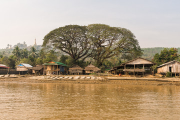 house on the river tropical boat asia myanmar 